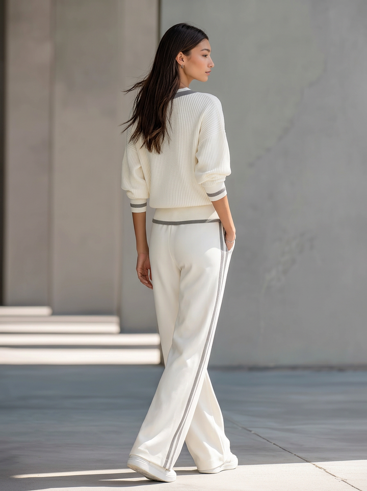 Off-white lightweight sweater and wide-leg trousers set