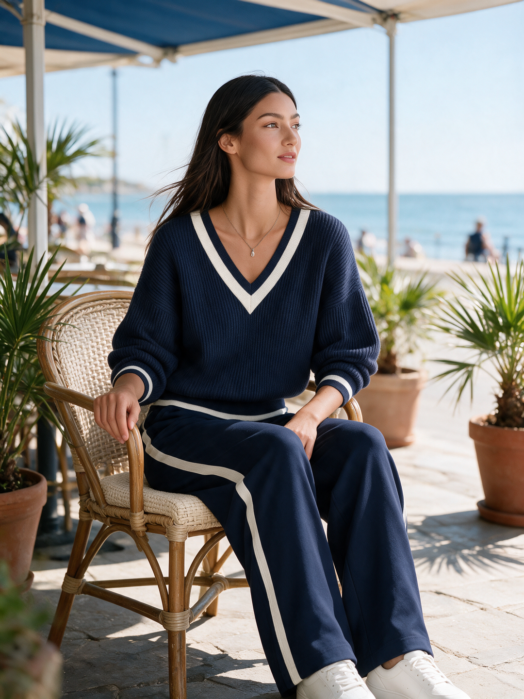 Off-white lightweight sweater and wide-leg trousers set